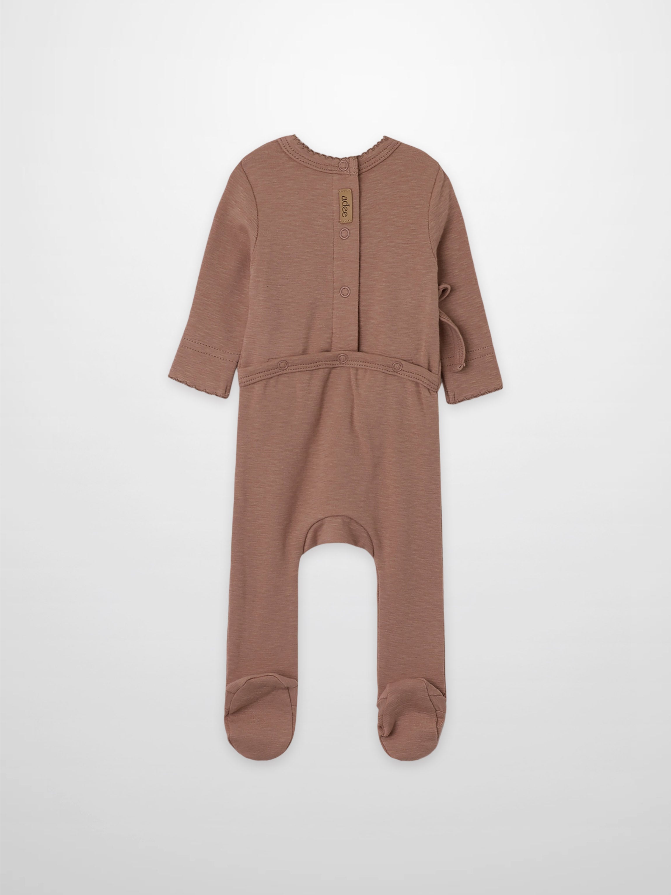 Pink Scalloped Stretchy girls romper in dusty pink by Adee, footed one-piece with scalloped trim.