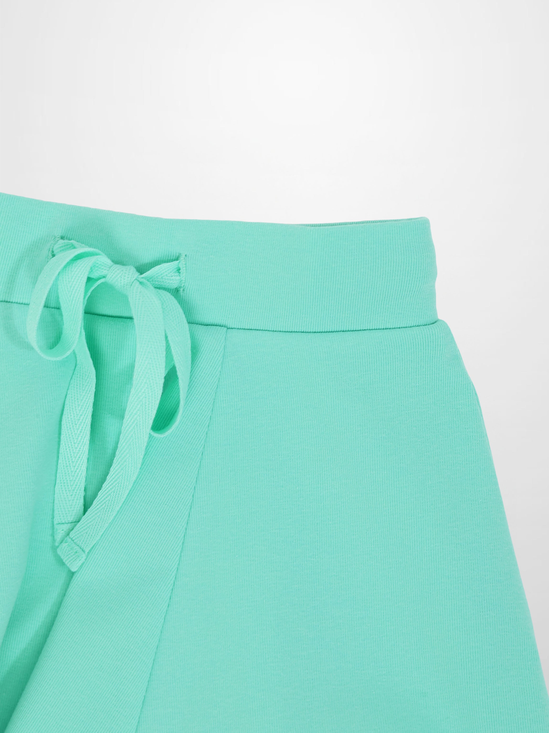 Mint green 6-panel skirt with drawstring waist.