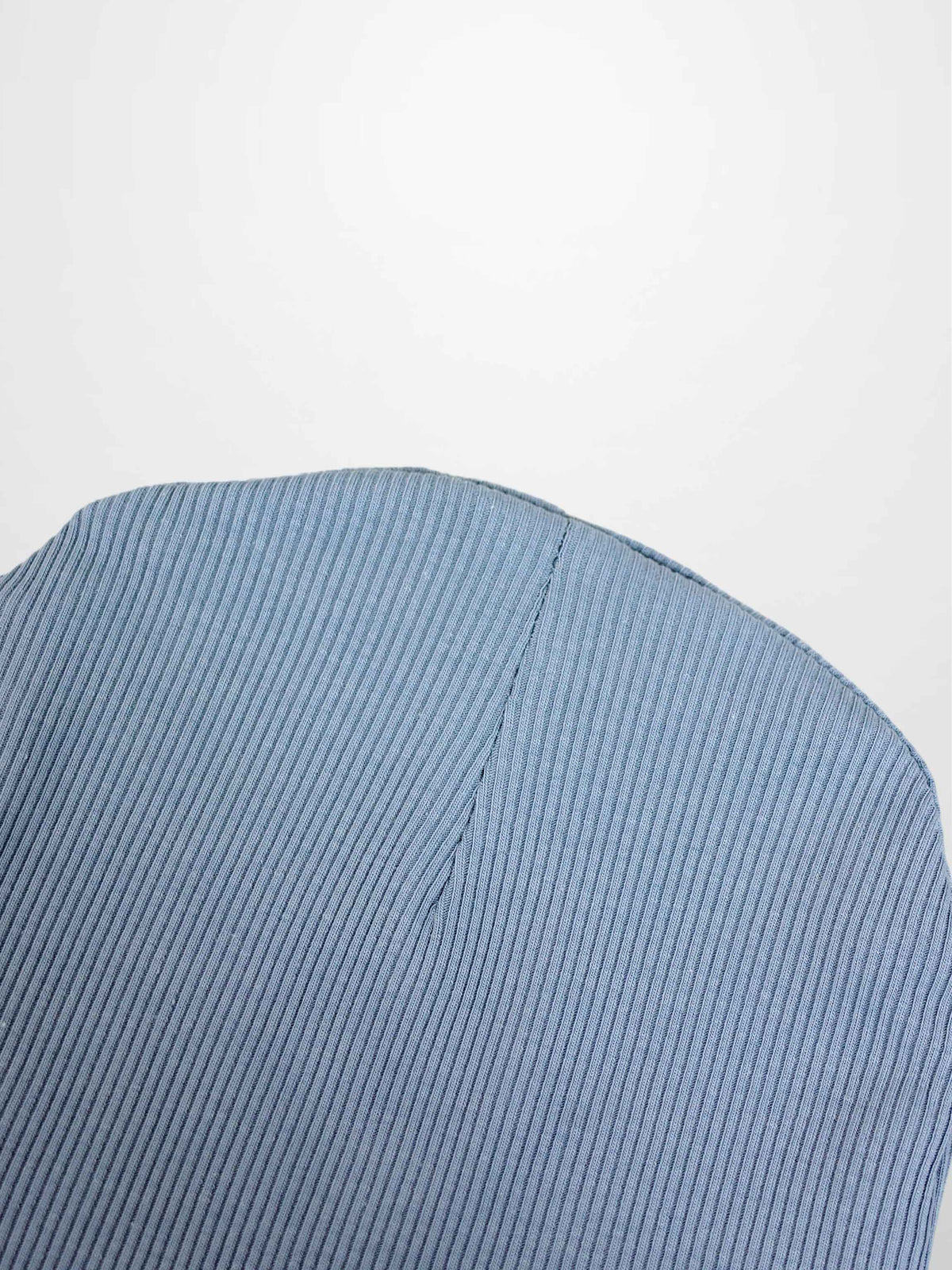 Thin ribbed beanie for boys in light blue; close-up knit fabric texture
