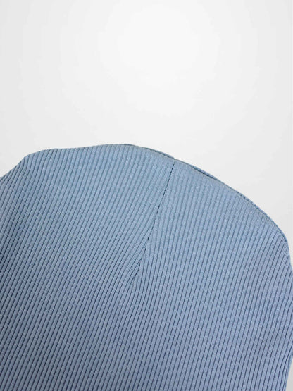 Thin ribbed beanie for boys in light blue; close-up knit fabric texture