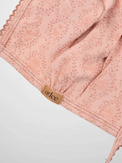 Pink Charm Bonnet by Adee with trailing vine and leaf motif