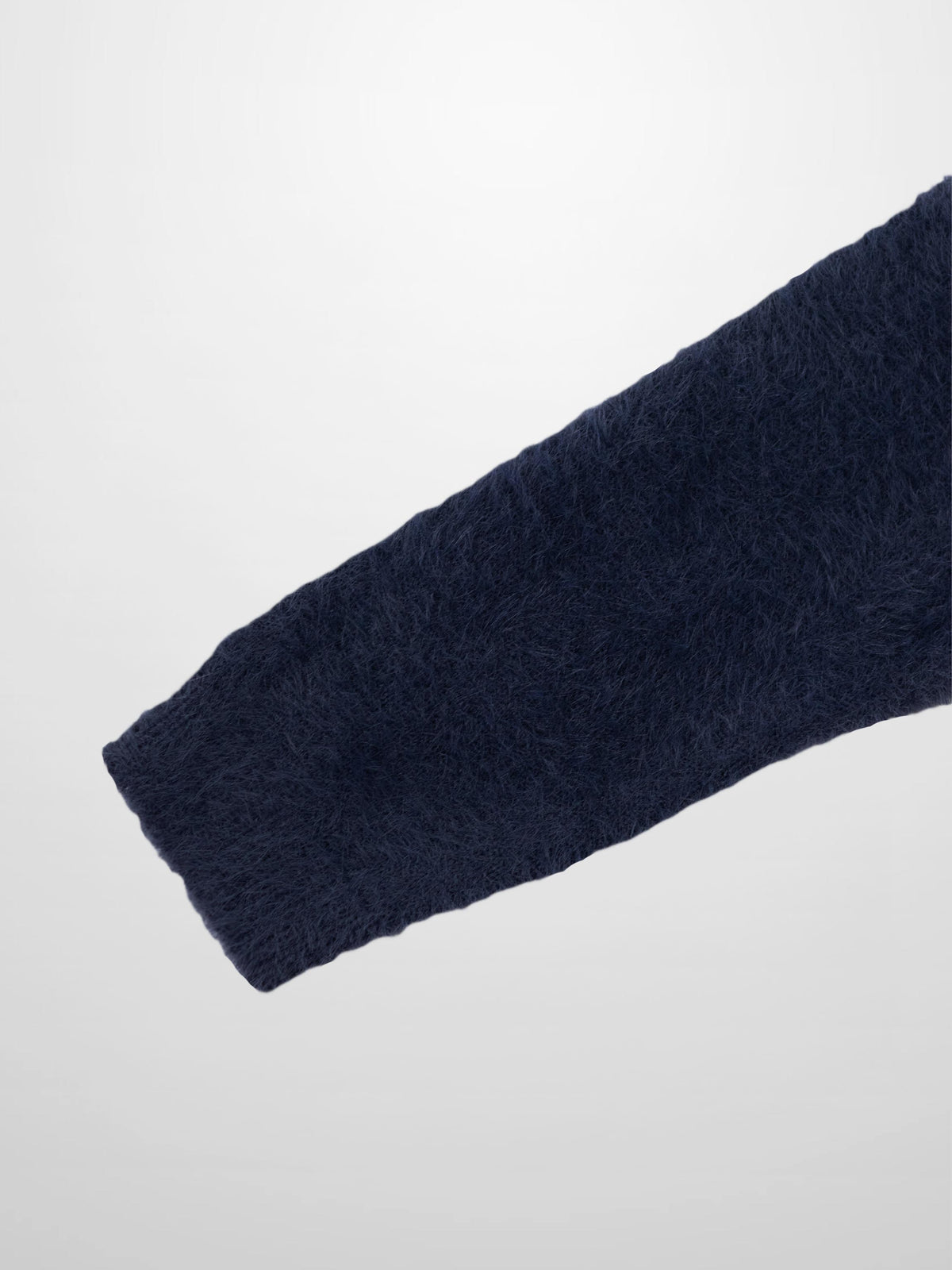 Mohair sweater sleeve in navy blue; soft, luxurious knit fabric