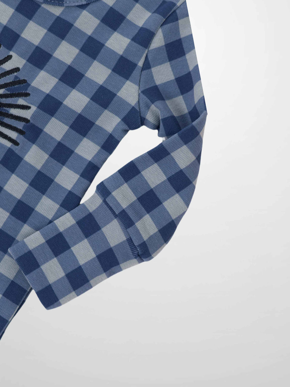 Blue Gingham Stretchy baby footie featuring sun embroidery and Adee script, back snaps and a hidden inseam zipper.