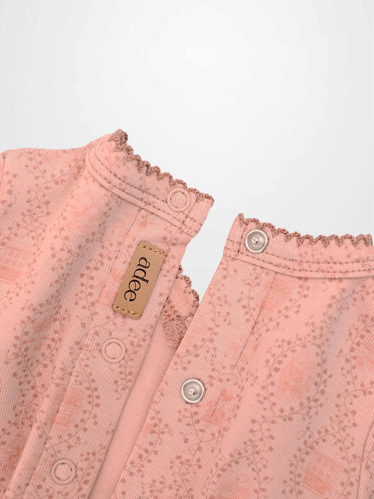Pink Charm Stretchy Girls Stretchies knit with trailing vine print and snap closures, Adee tag