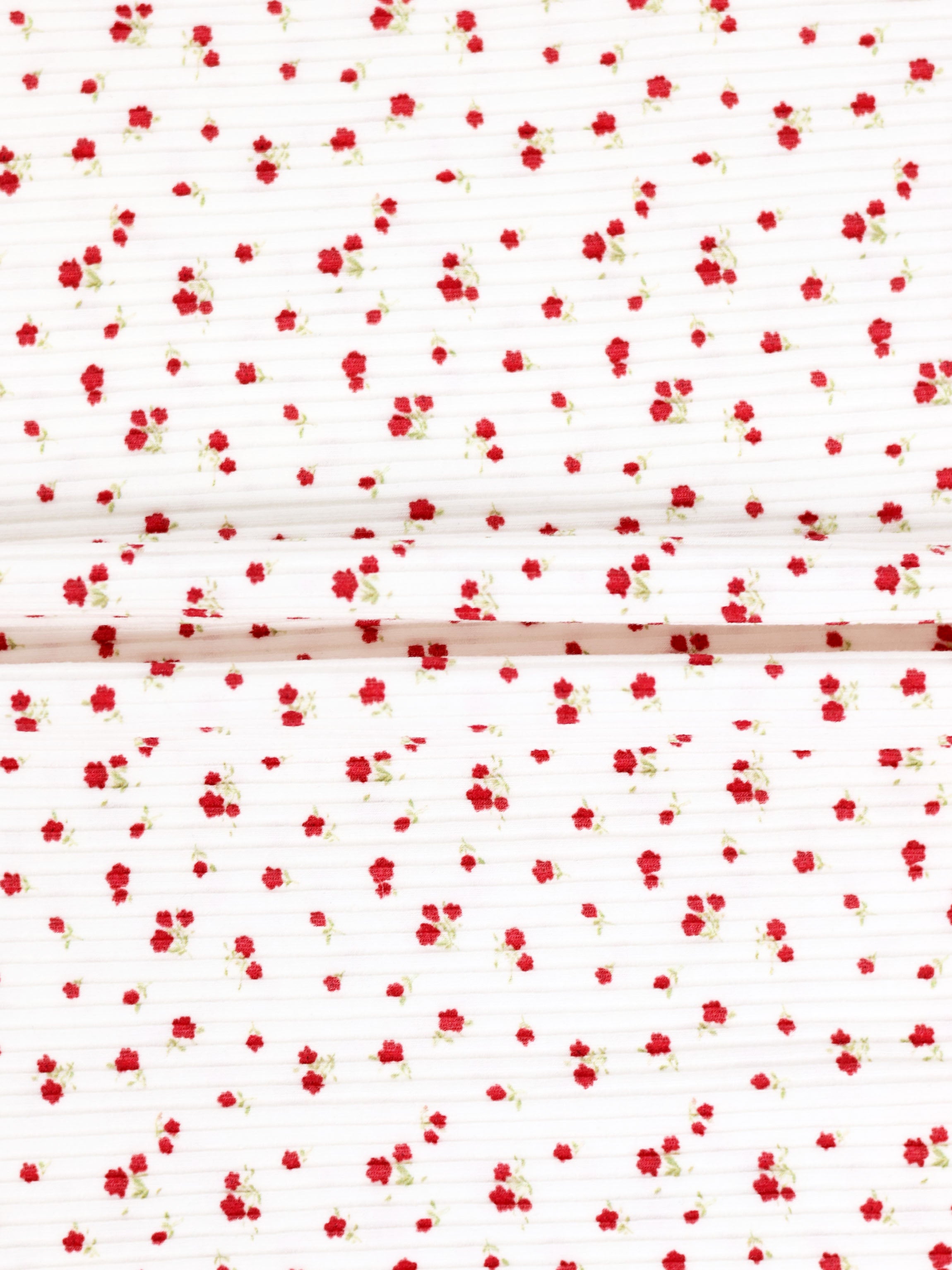 Red Flower Stretchy girls stretchies fabric with tiny red flowers on white background, two folded panels