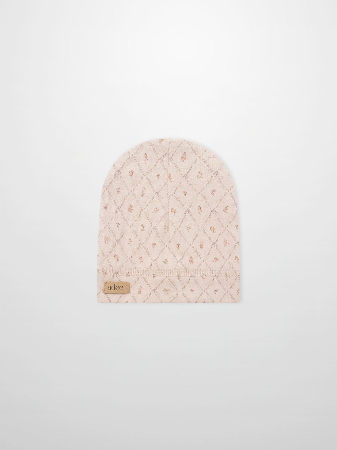 Dainty Diamond Hat for girls in soft pink quilted fabric with diamond pattern by Adee