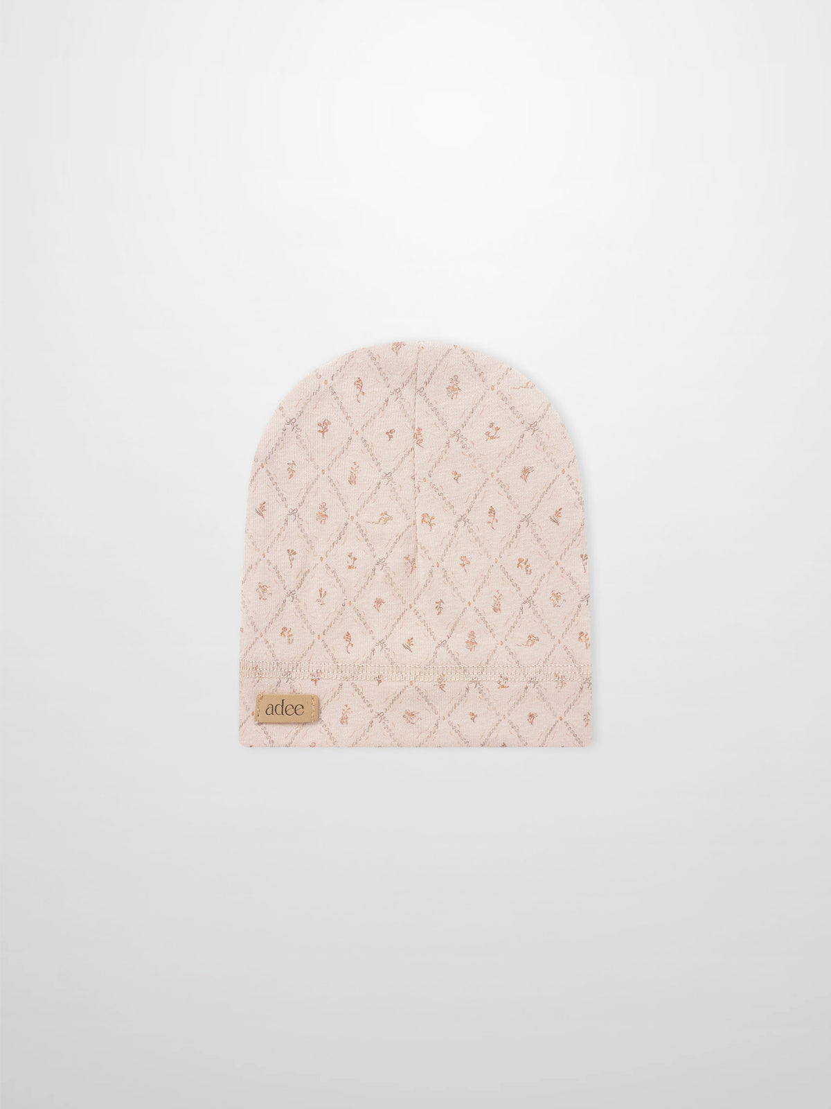 Dainty Diamond Hat for girls in soft pink quilted fabric with diamond pattern by Adee