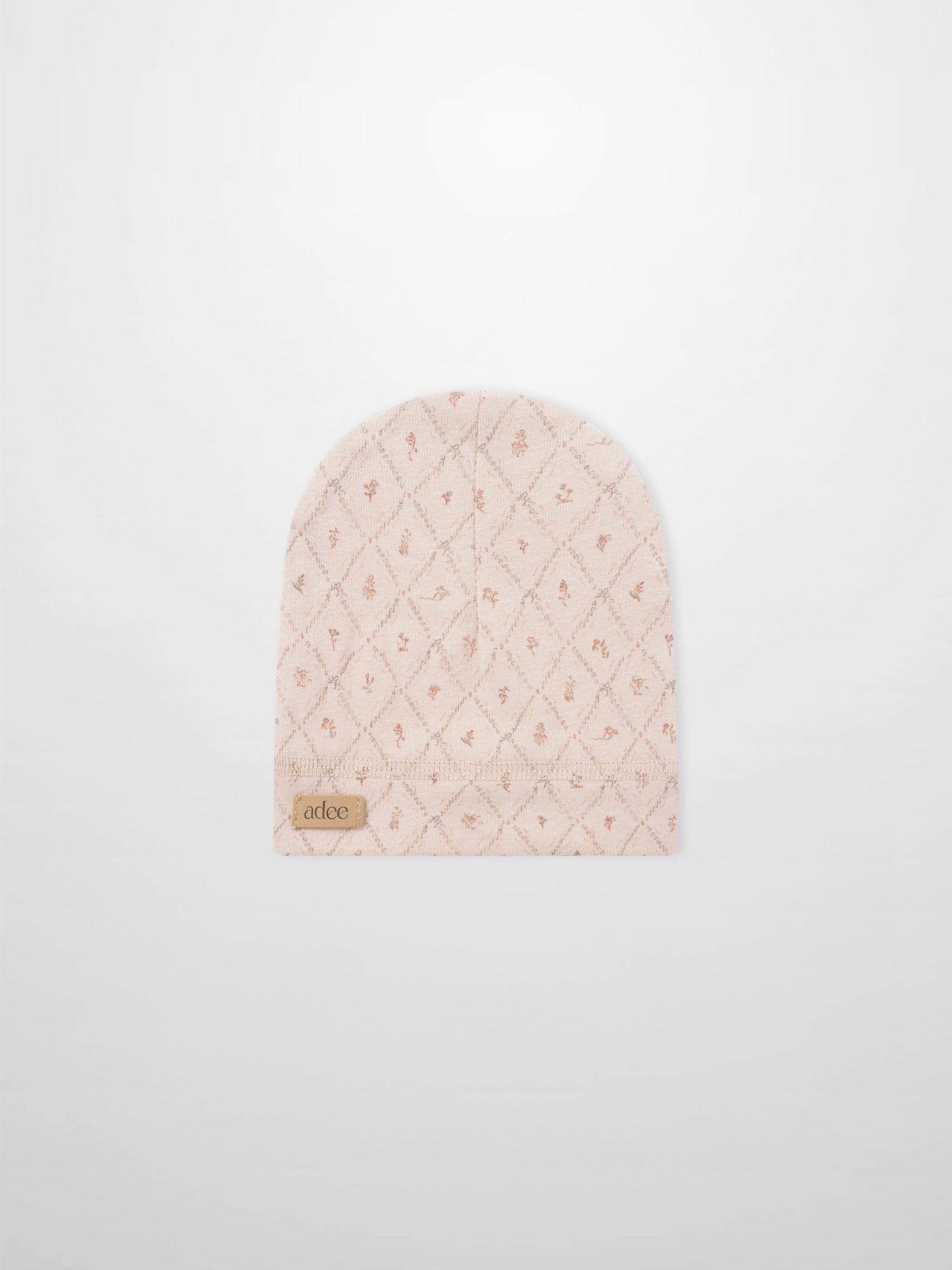 Dainty Diamond Hat for girls in soft pink quilted fabric with diamond pattern by Adee