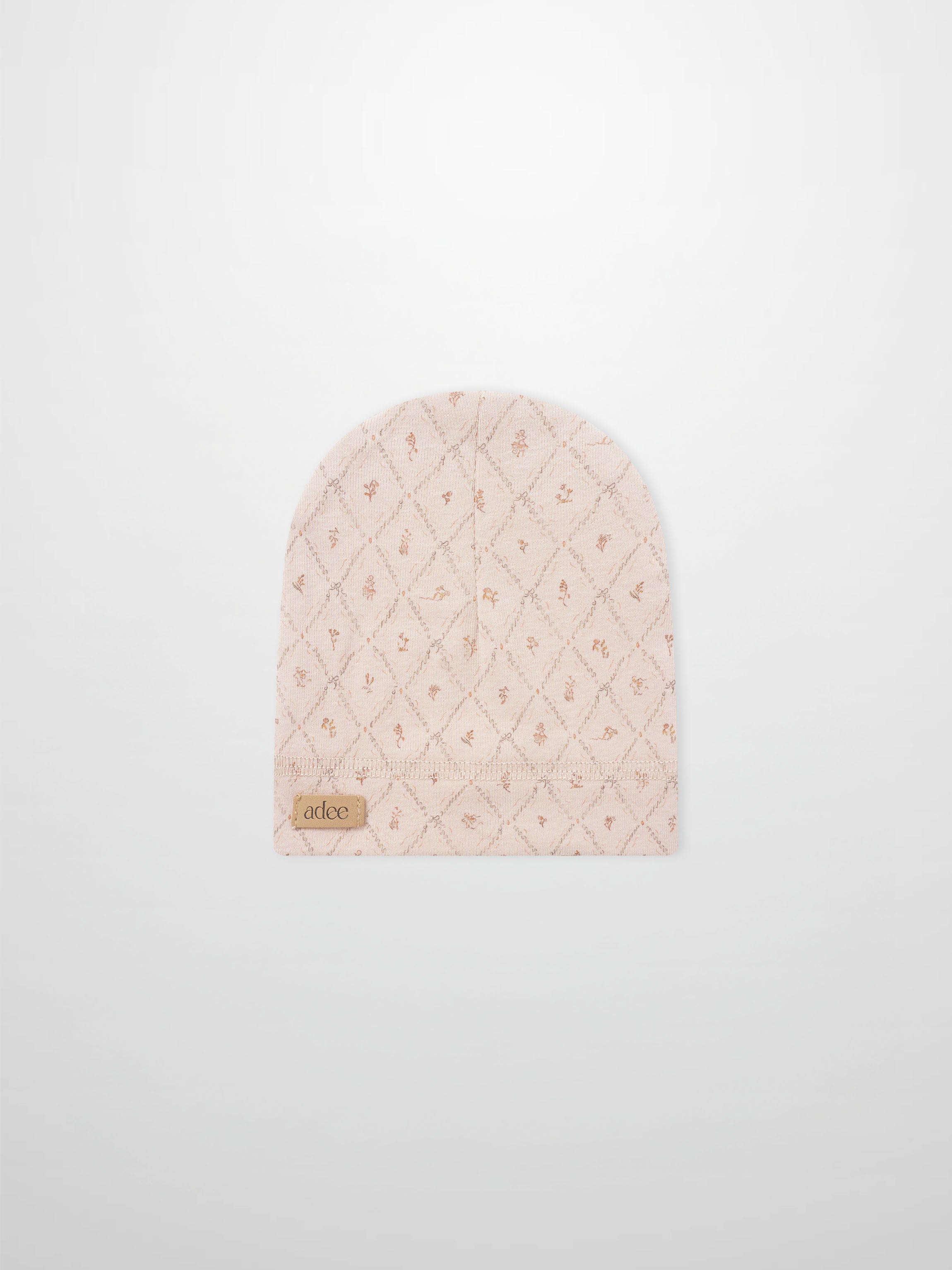 Dainty Diamond Hat for girls in soft pink quilted fabric with diamond pattern by Adee