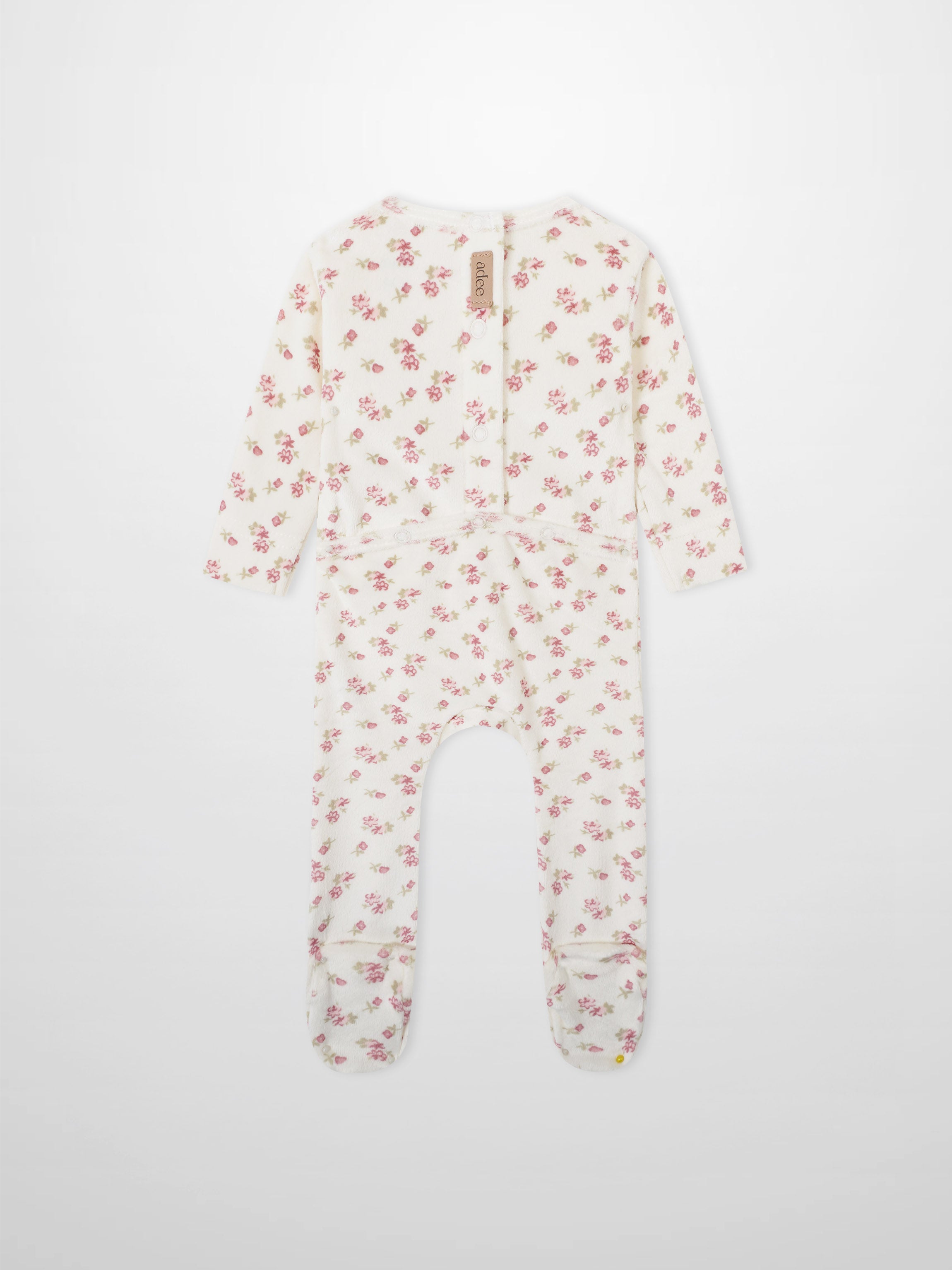 Tiny Blossom Stretchy romper by Adee in cream with pink floral print.