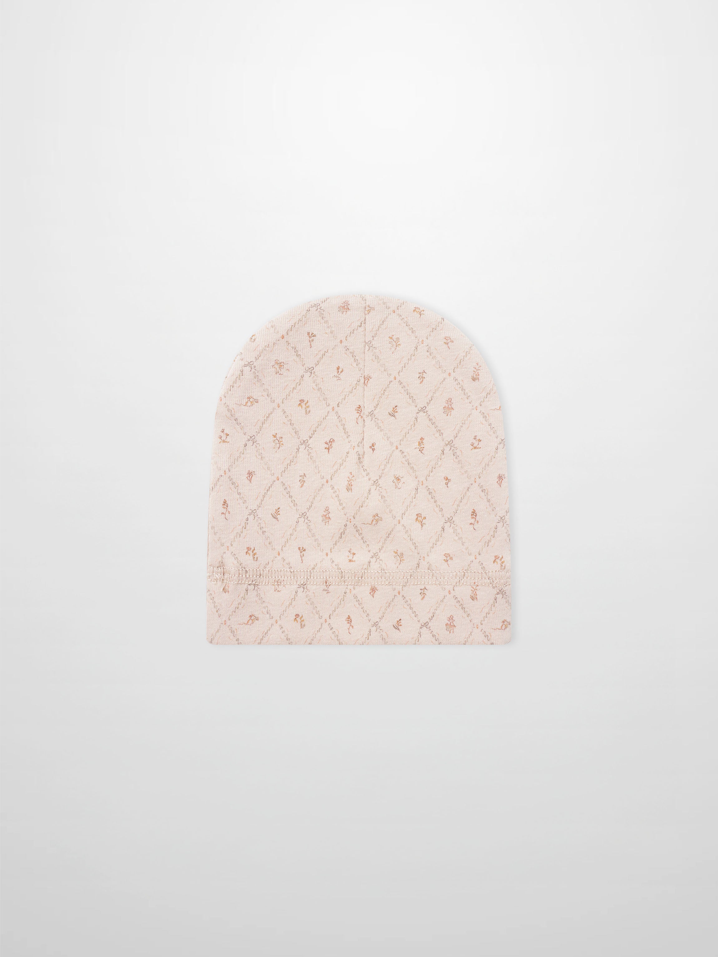 Dainty Diamond Hat by Adee for girls; pale pink knit with a diamond lattice pattern.