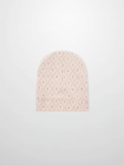 Dainty Diamond Hat by Adee for girls; pale pink knit with a diamond lattice pattern.