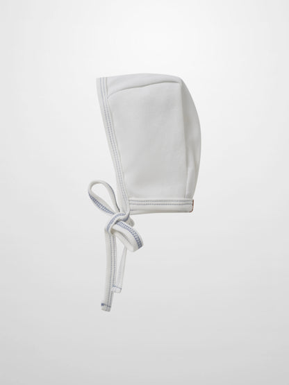 Mini Gallery Bonnet for boys, white fabric with blue stitched trim and tie strings