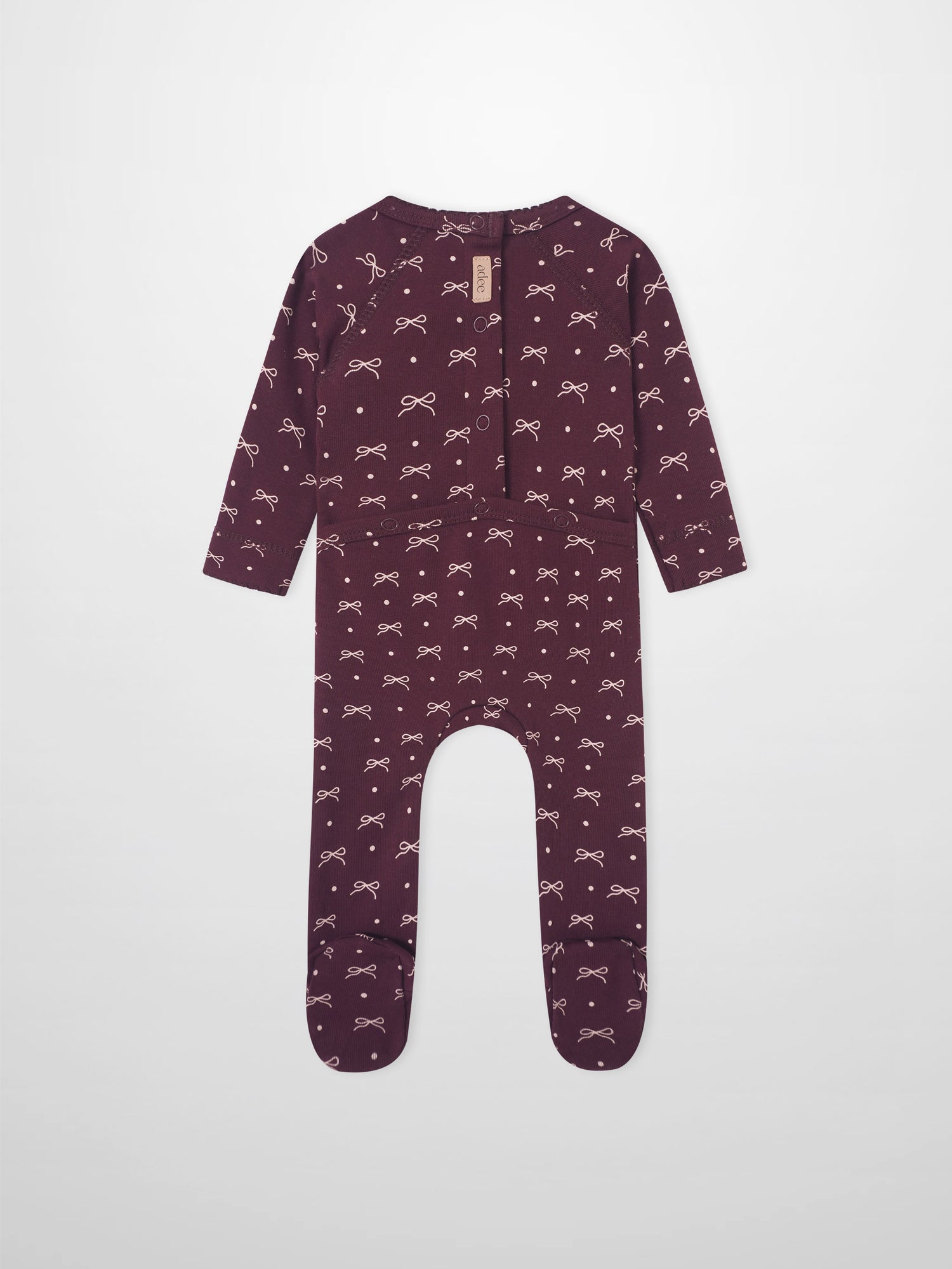 Girls Stretchies by Adee in burgundy with white bow prints and dot pattern