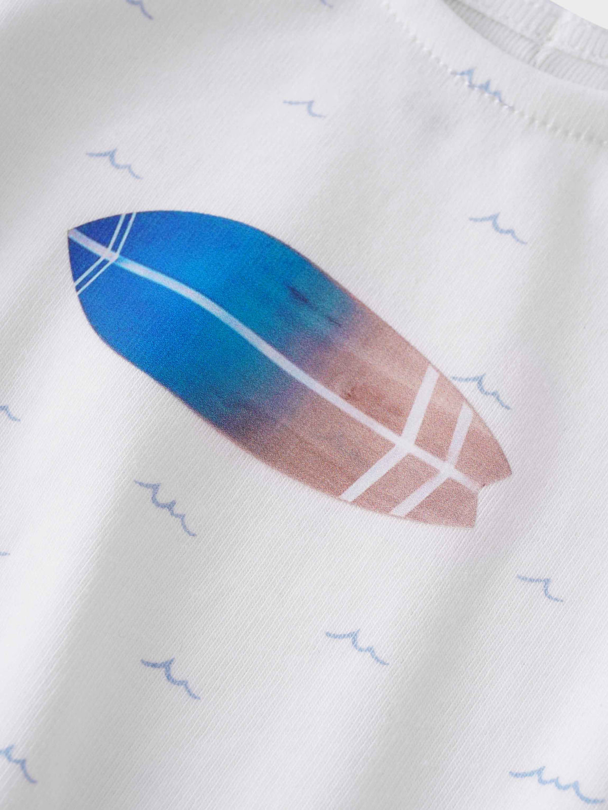 Ombre surfboard on romper