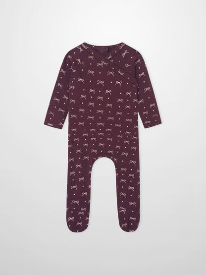 Burgundy Bow Stretchy girls romper by Adee, with allover light-pink bows and dots; footed design.