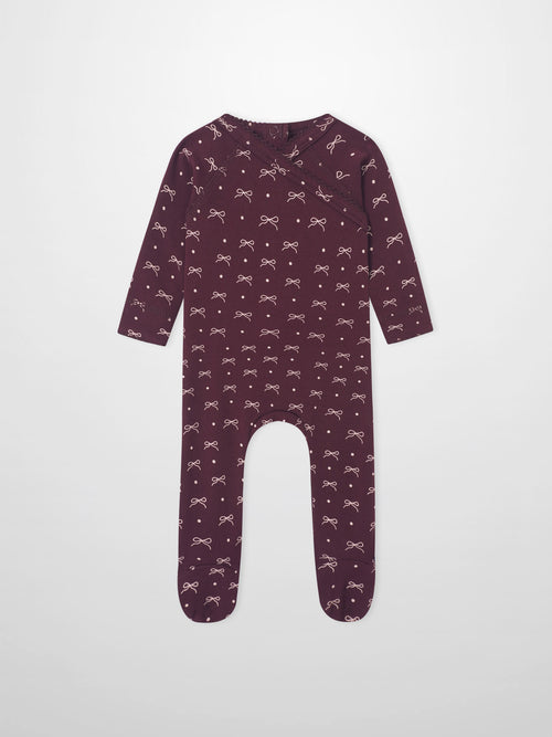 Burgundy Bow Stretchy girls romper by Adee, with allover light-pink bows and dots; footed design.