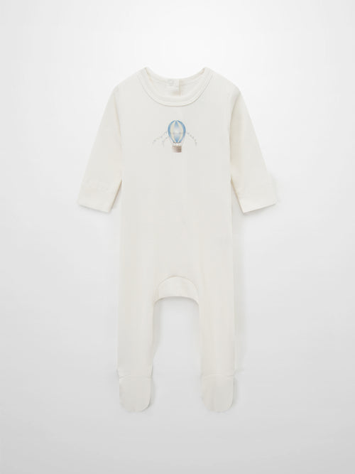 Blue Balloon Stretchy romper; cream ribbed fabric with footed long-sleeve design.