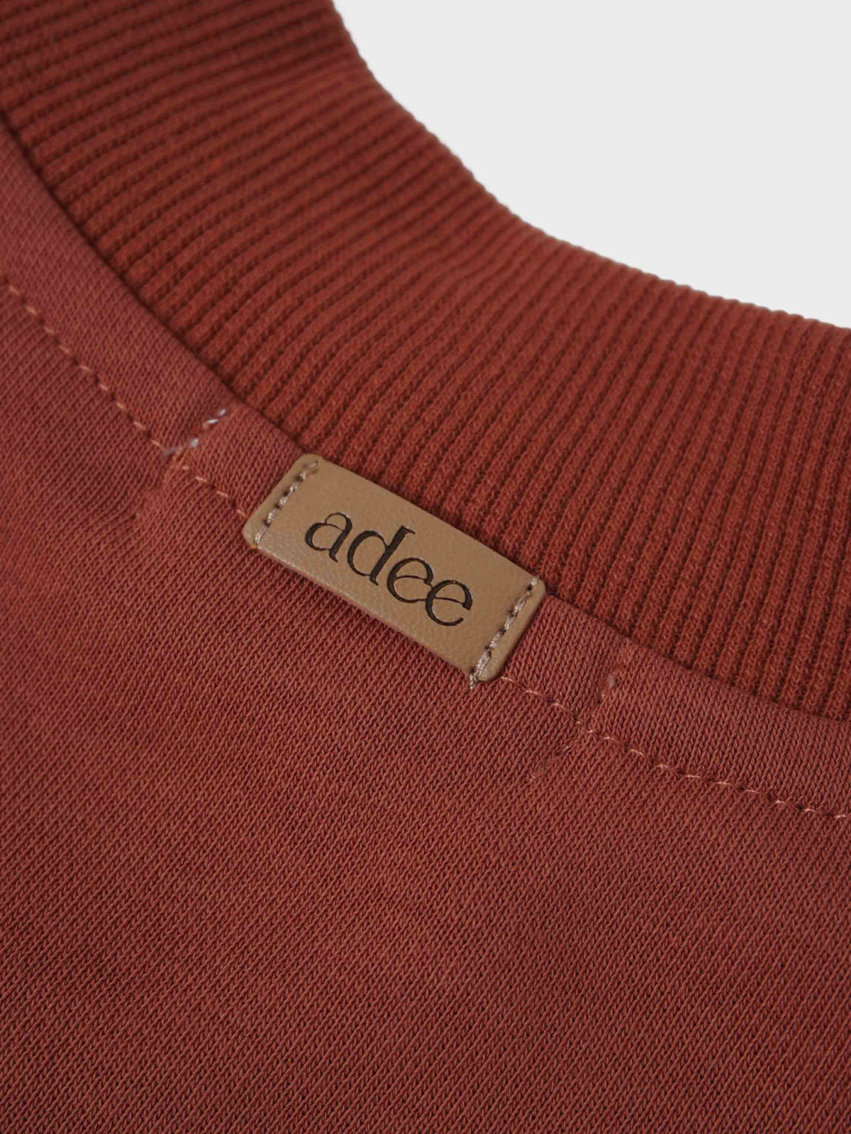 Embossed Mug Sweatshirt &amp; Leggings set for little girls in rust by Adee, with tan logo tag.