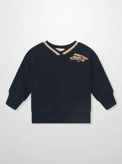 Adee Embroidered Jet Sweatshirt for boys; navy blue knit with tan V-neck stripe and aircraft embroidery on chest.