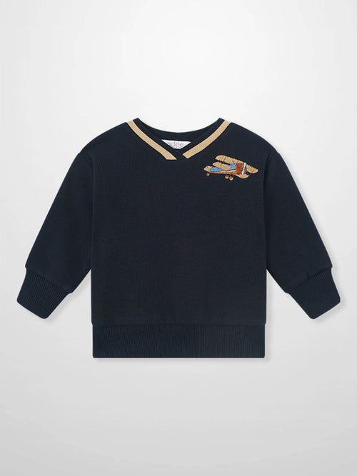 Adee Embroidered Jet Sweatshirt for boys; navy blue knit with tan V-neck stripe and aircraft embroidery on chest.