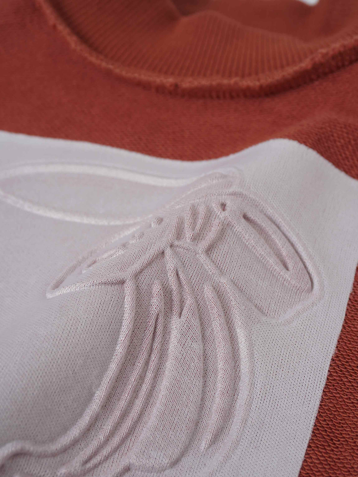 Embossed Mug Sweatshirt &amp; Leggings Set for little girls; white knit fabric close-up