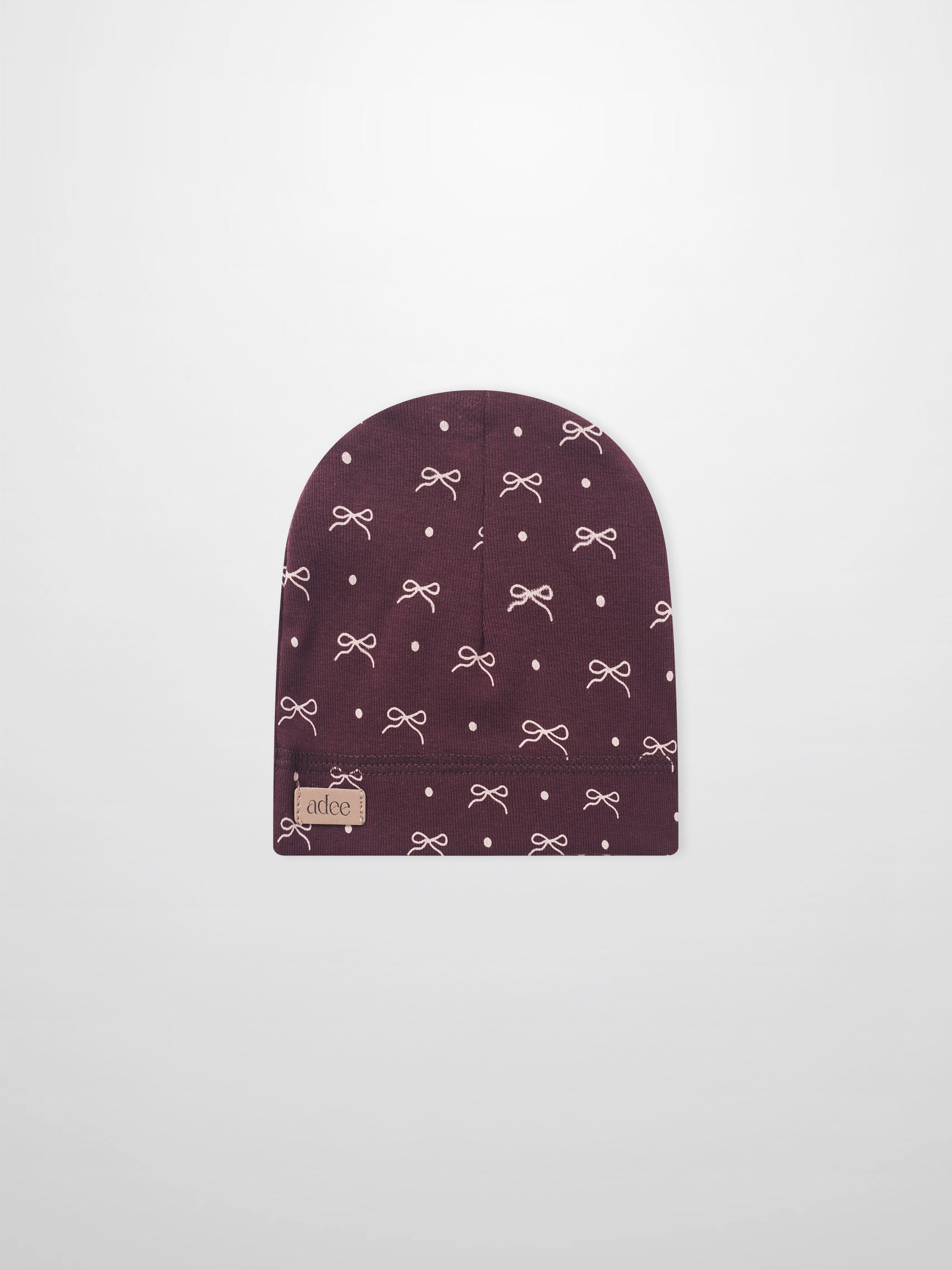 Burgundy bow hat for girls by Adee with white bow pattern