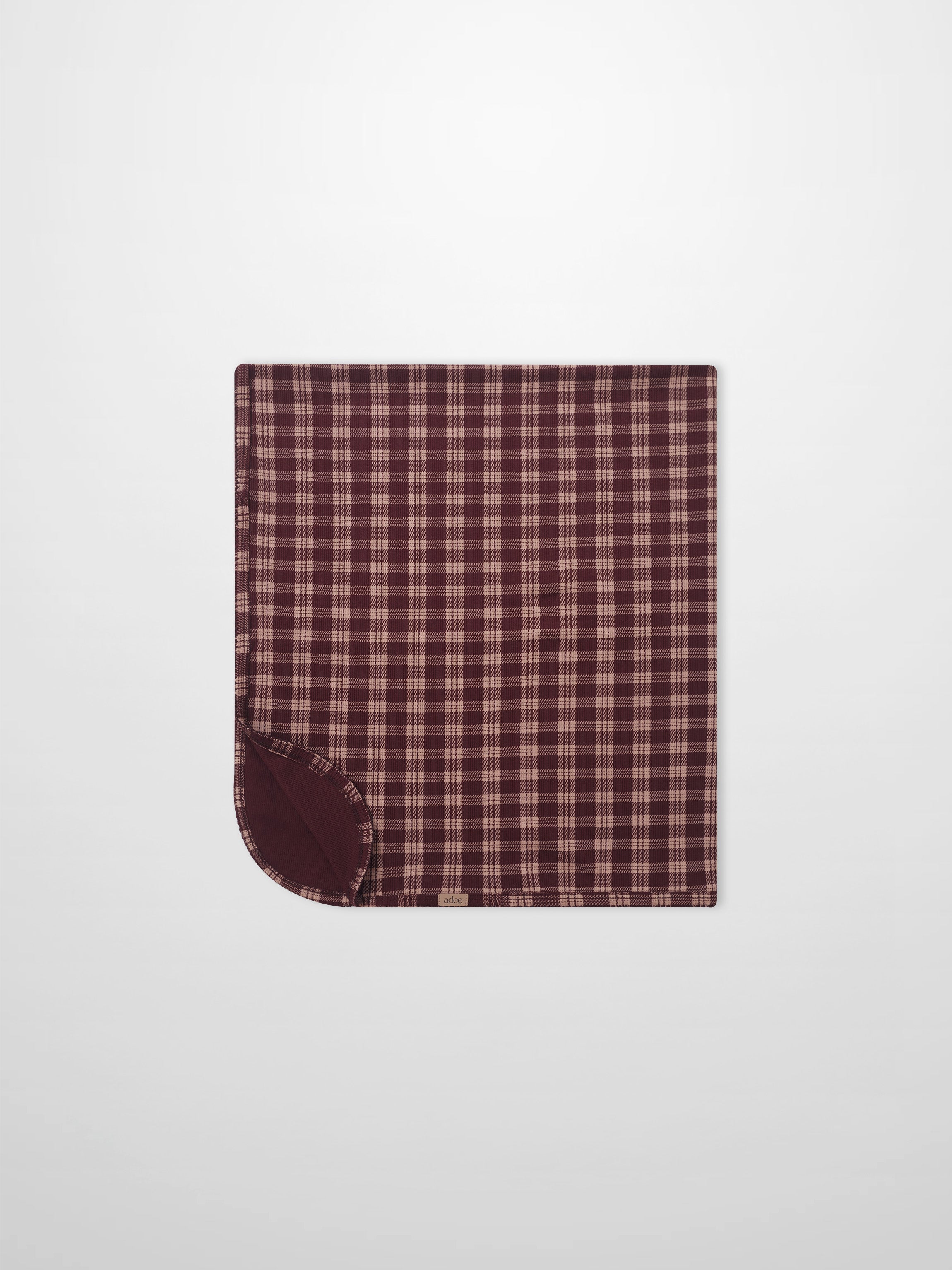 Girls swaddle blanket, burgundy plaid with scalloped trim, Adee brand.