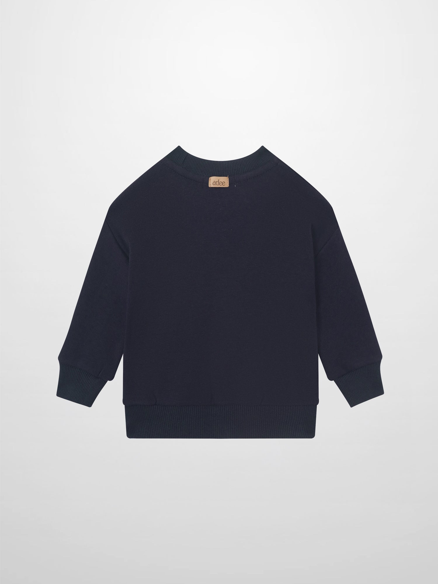 Merci Sweatshirt - Navy for boys by Adee; navy long-sleeve top with ribbed cuffs and tan back-neck tag.