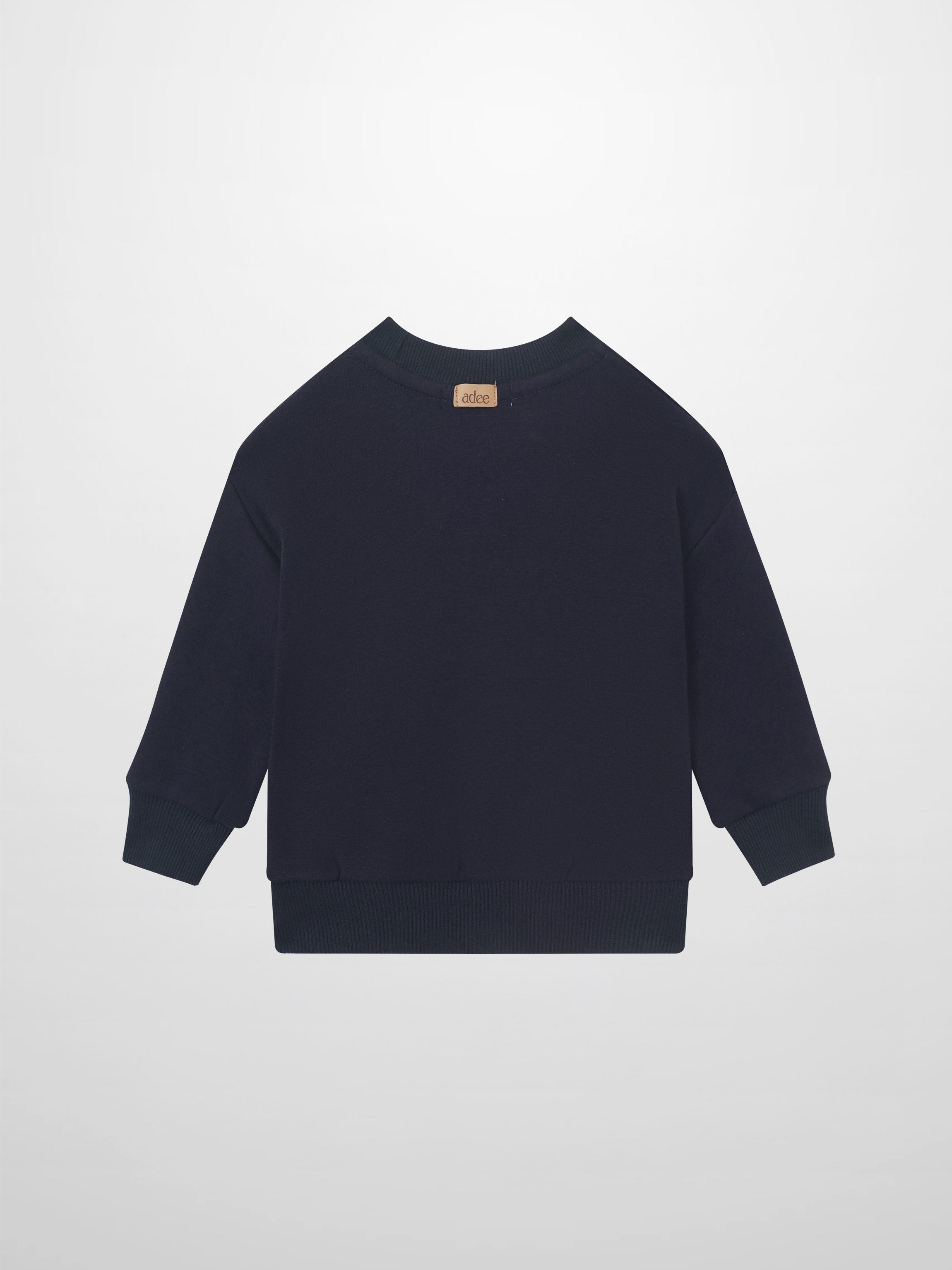 Merci Sweatshirt - Navy for boys by Adee; navy long-sleeve top with ribbed cuffs and tan back-neck tag.