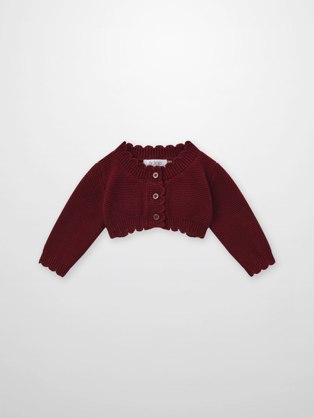 Adee cropped burgundy cardigan, unisex dressy knit with ribbed collar and button placket.