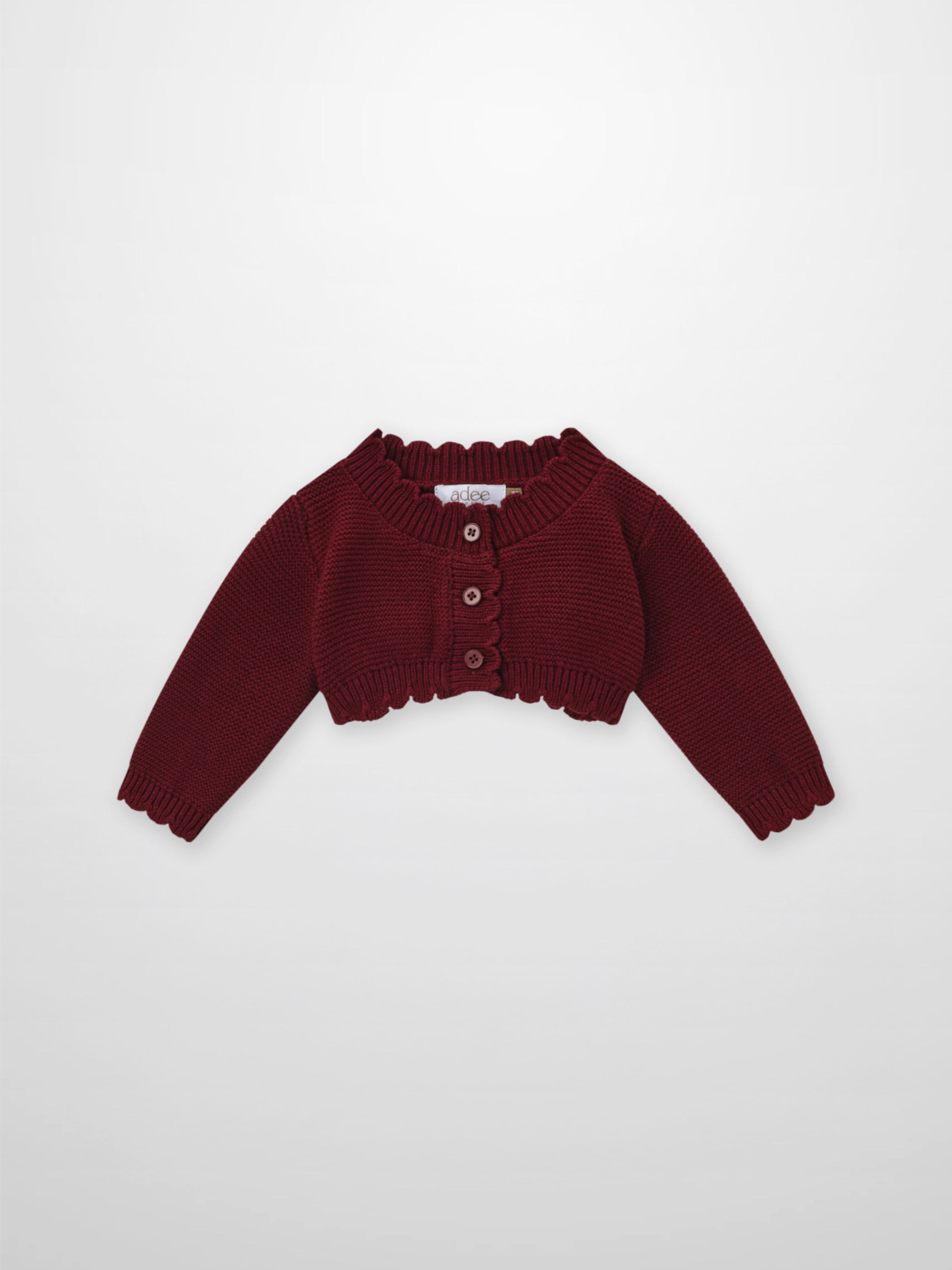 Adee cropped burgundy cardigan, unisex dressy knit with ribbed collar and button placket.