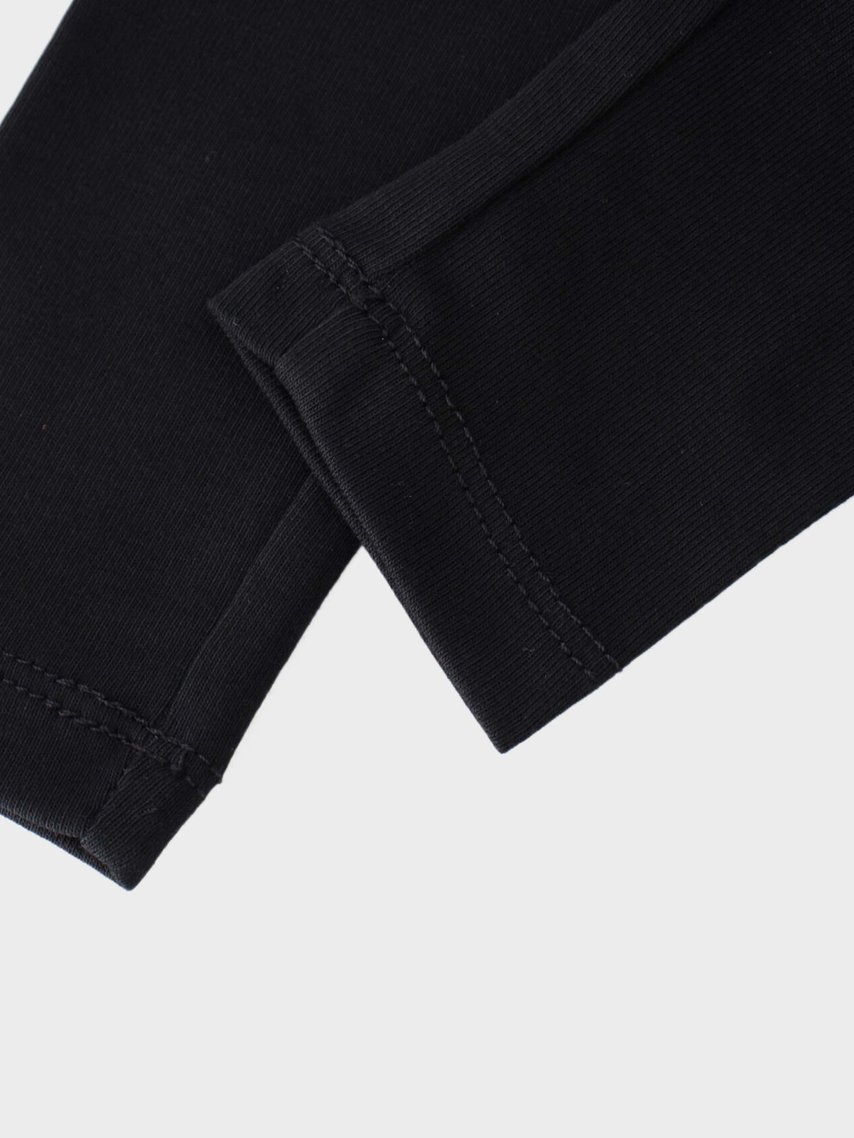 Close-up of black sweatshirt legging set