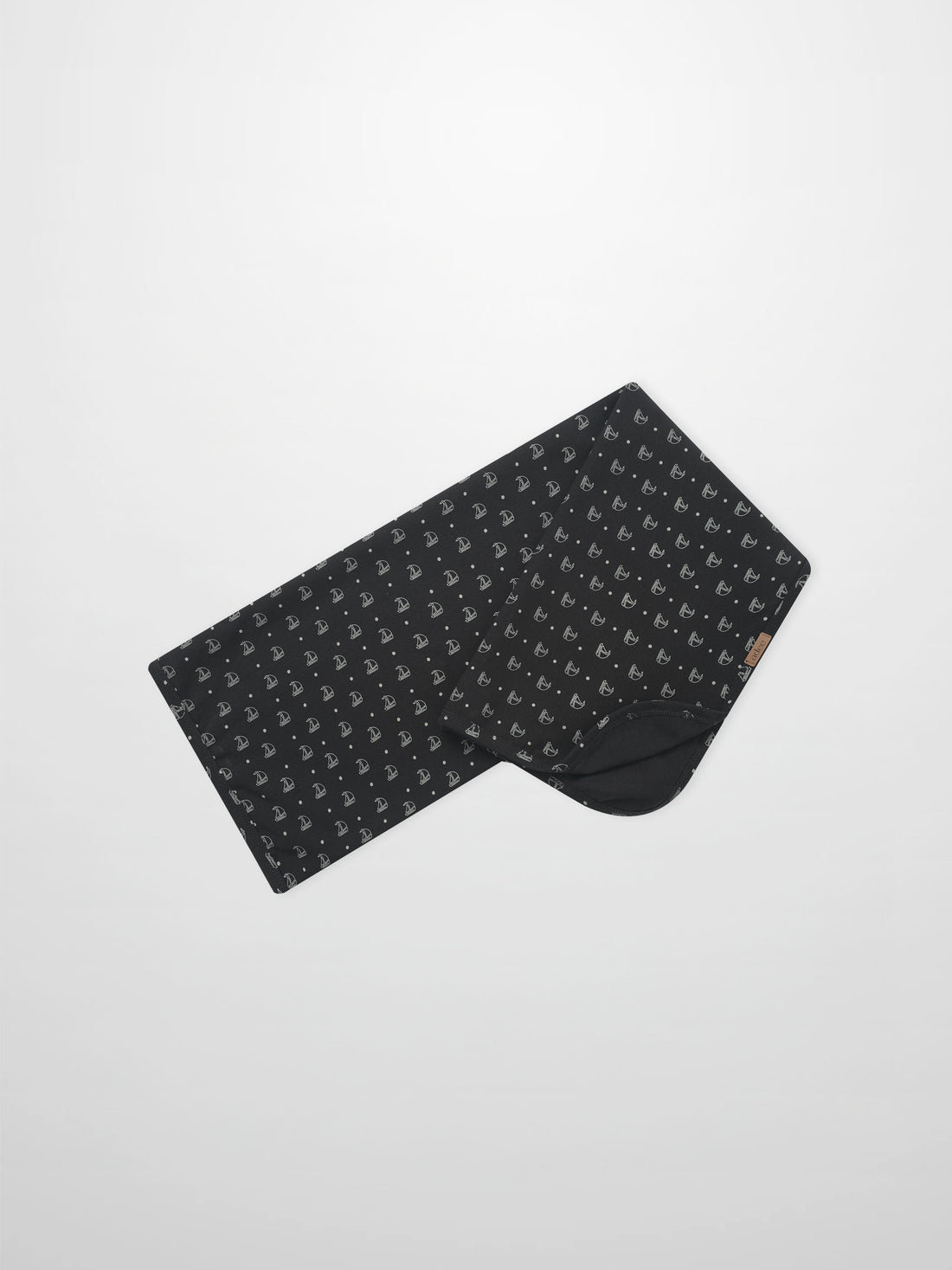 Harbor Dot Blanket by Adee; boys swaddle blanket in dark navy with white sailboat motifs.