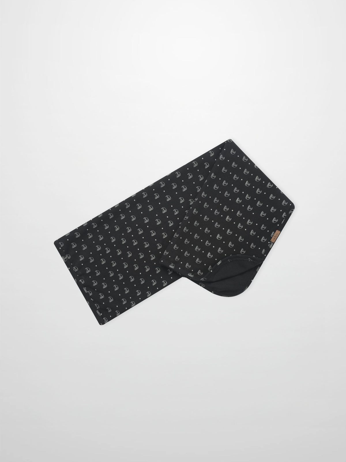 Harbor Dot Blanket by Adee; boys swaddle blanket in dark navy with white sailboat motifs.