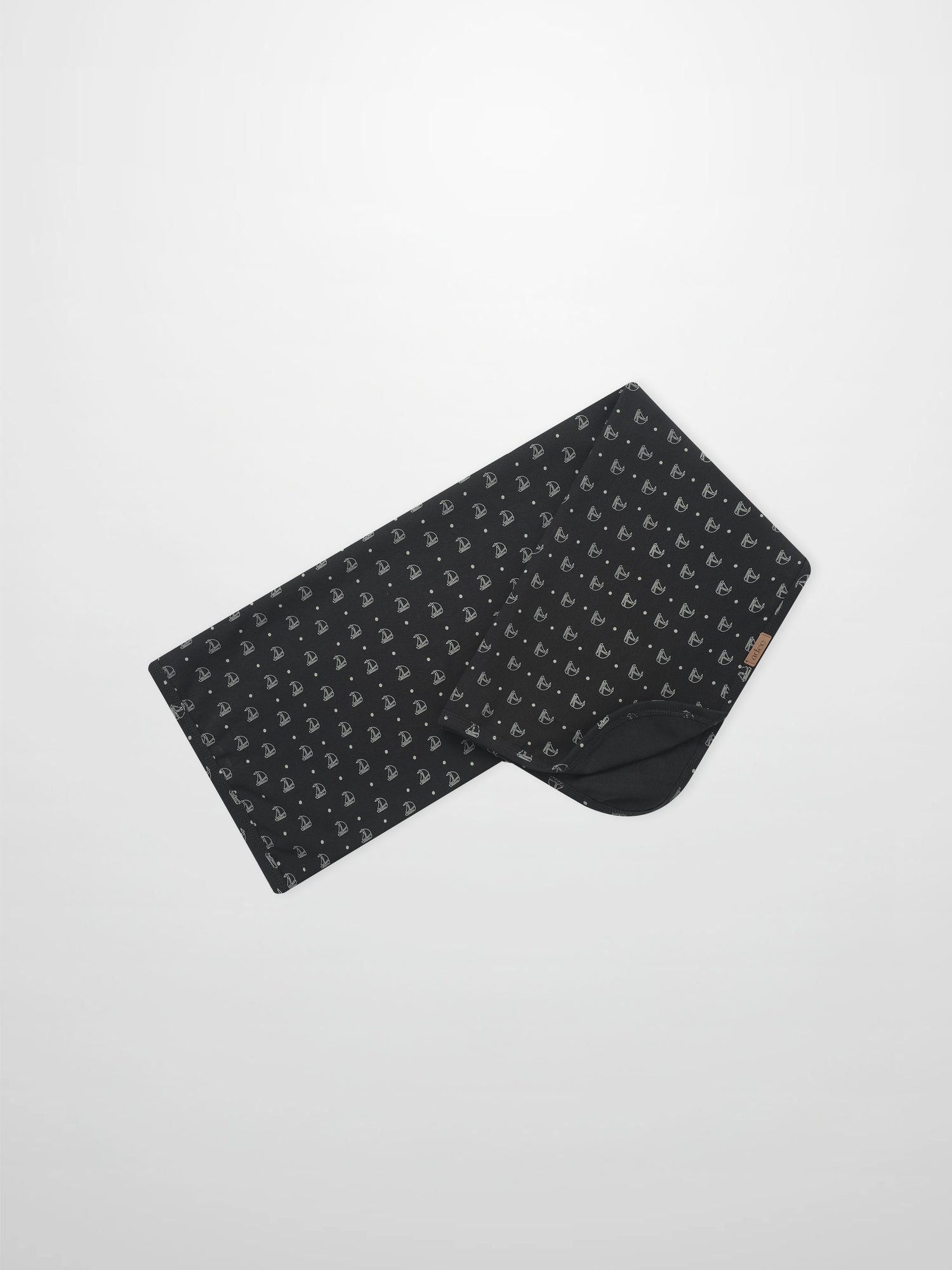Harbor Dot Blanket by Adee; boys swaddle blanket in dark navy with white sailboat motifs.