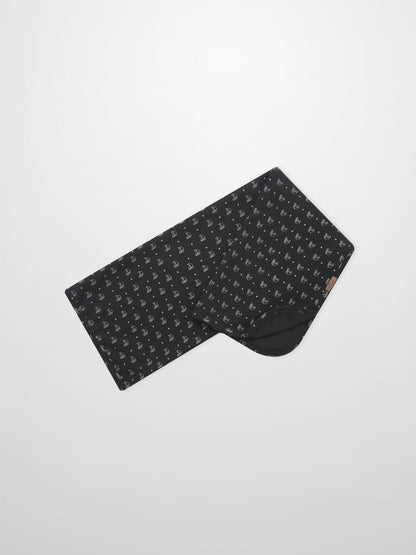 Harbor Dot Blanket by Adee; boys swaddle blanket in dark navy with white sailboat motifs.