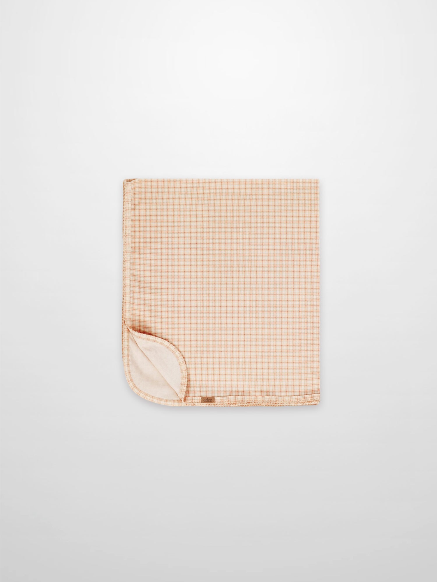 Oatmeal Grid Blanket Pink for girls, Adee receiving swaddle blanket with light pink grid.