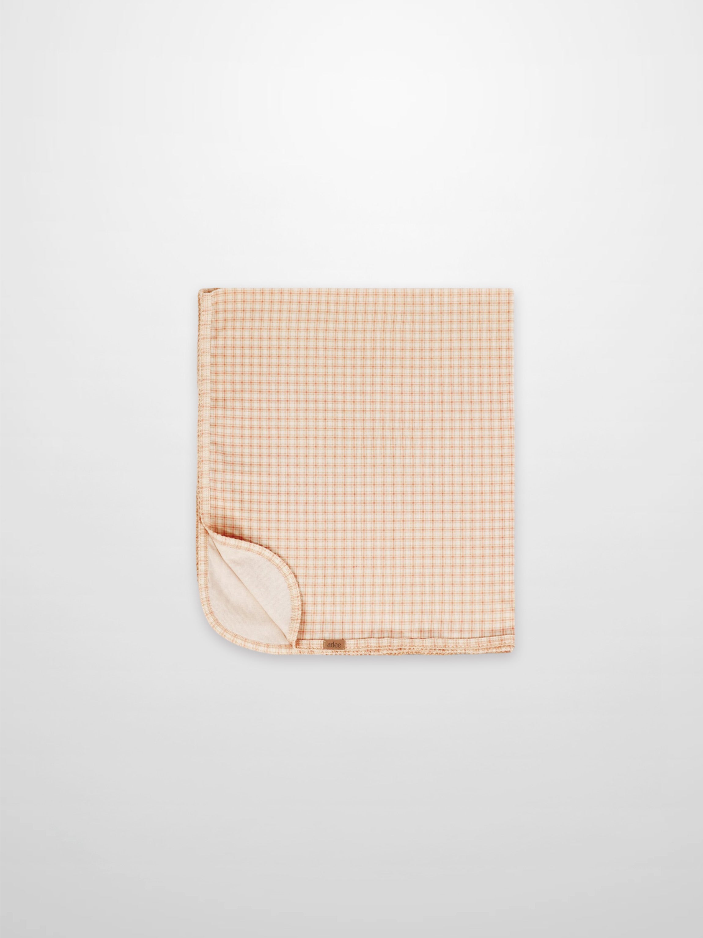 Oatmeal Grid Blanket Pink for girls, Adee receiving swaddle blanket with light pink grid.