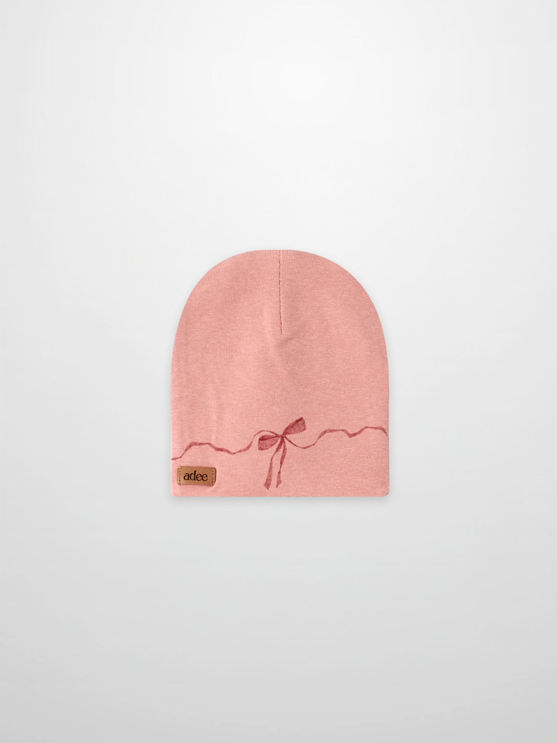 Pink bow beanie with soft-knit wavy ribbon detail by Adee