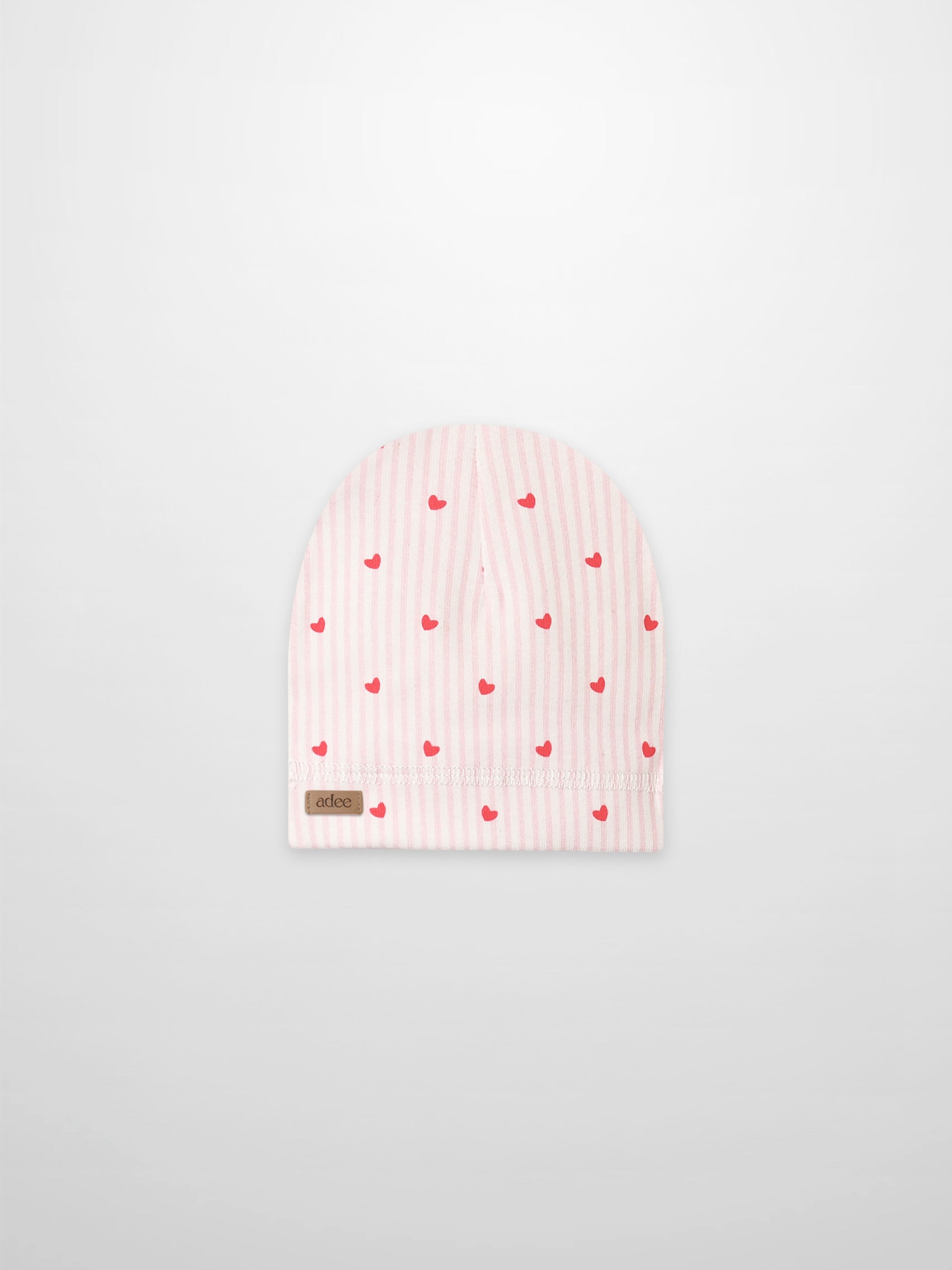 Pink Heart Hat for girls by Adee, pink striped beanie with red hearts, folded cuff and visible brown Adee tag.