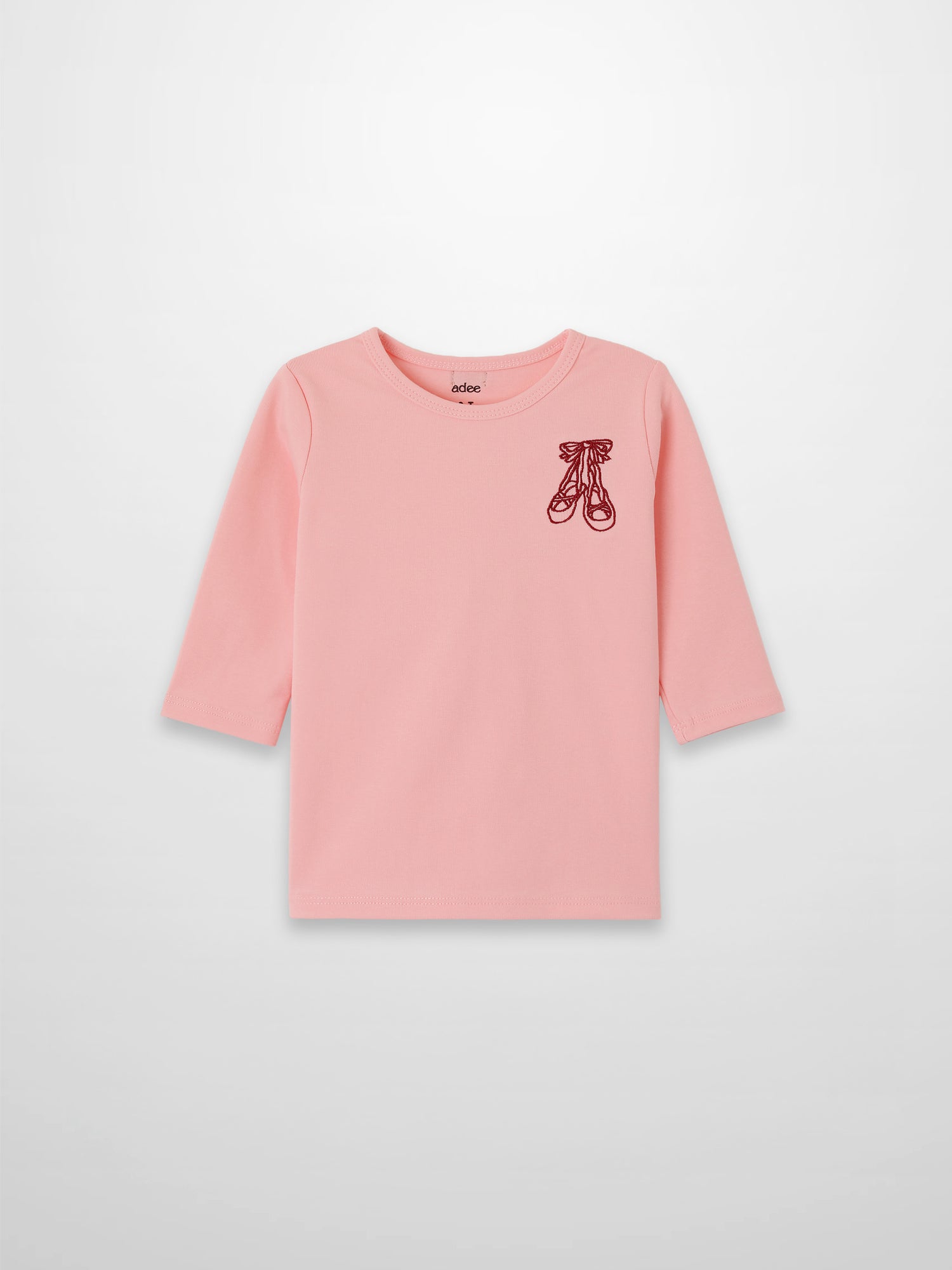 Light pink 3/4 sleeve T-shirt with burgundy ballet shoes embroidery on the chest.