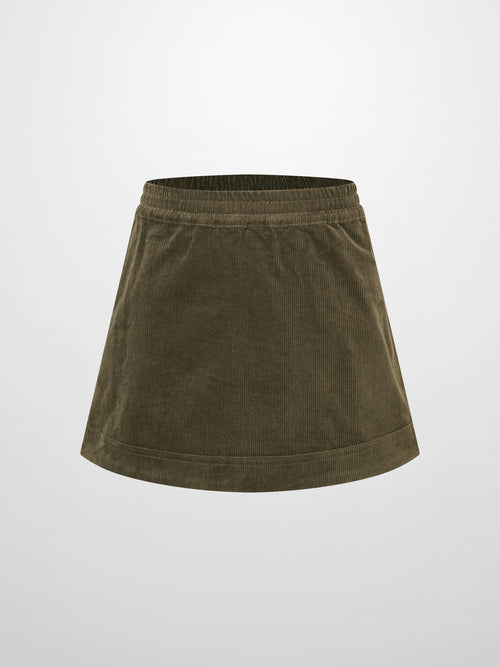 Corduroy Skirt - Green in forest green with elastic waistband and gentle gathers, A-line silhouette.