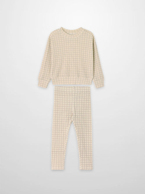 Blue Squared Boys Pajamas by Adee, cream two-piece set with blue grid pattern, long-sleeve top and pants