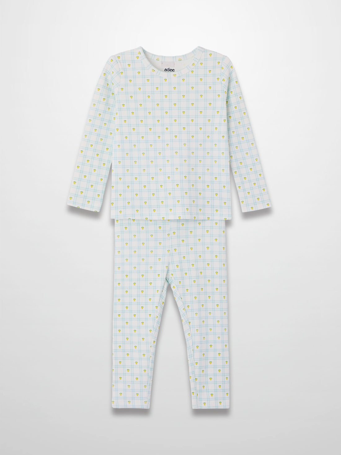 Lemon Window Pajamas: kids’ long-sleeve pajama set in white base with light blue grid and yellow lemons