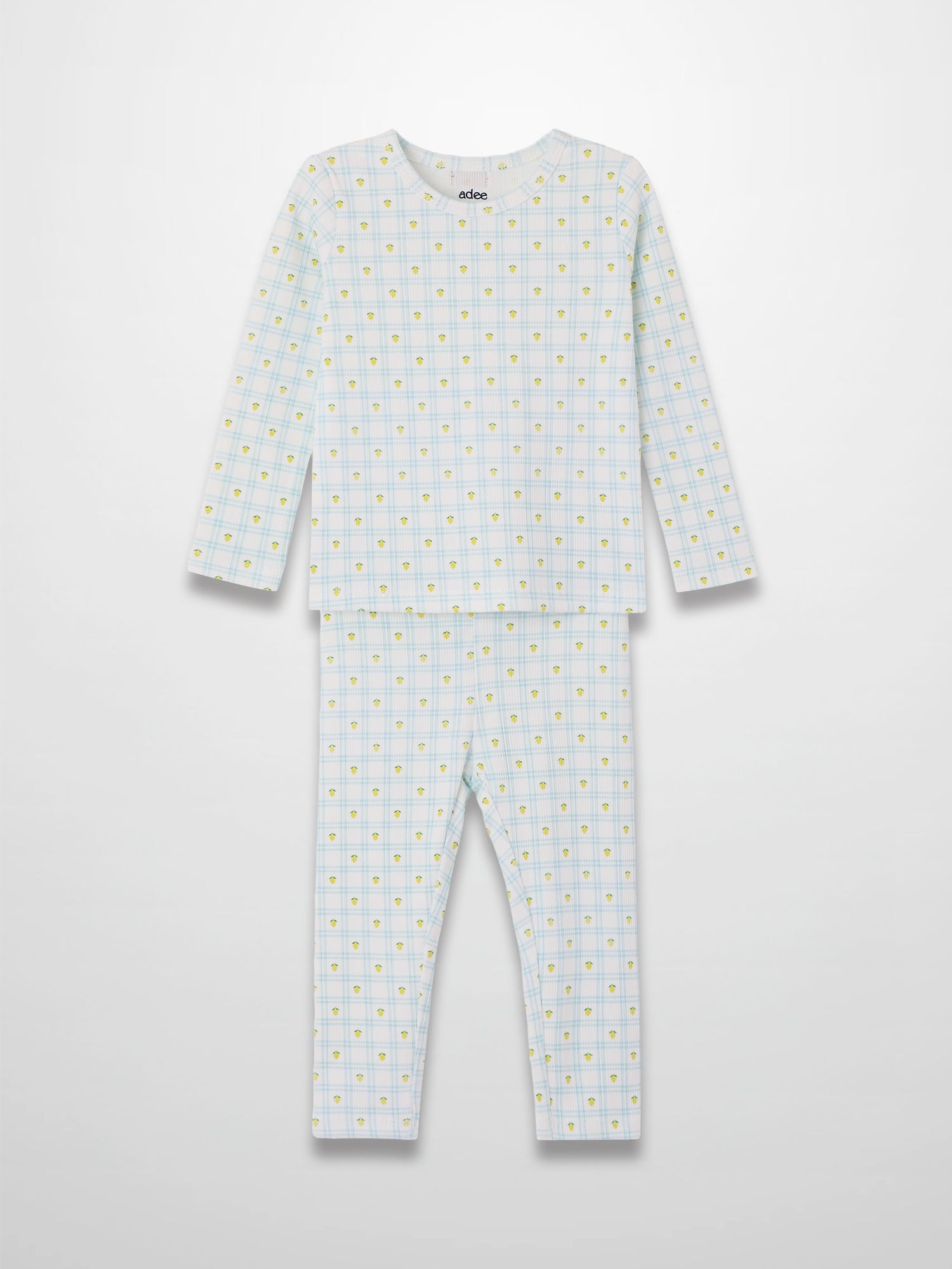 Lemon Window Pajamas: kids’ long-sleeve pajama set in white base with light blue grid and yellow lemons