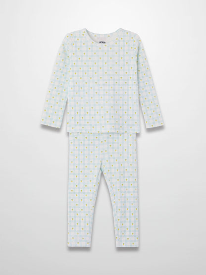 Lemon Window Pajamas: kids’ long-sleeve pajama set in white base with light blue grid and yellow lemons