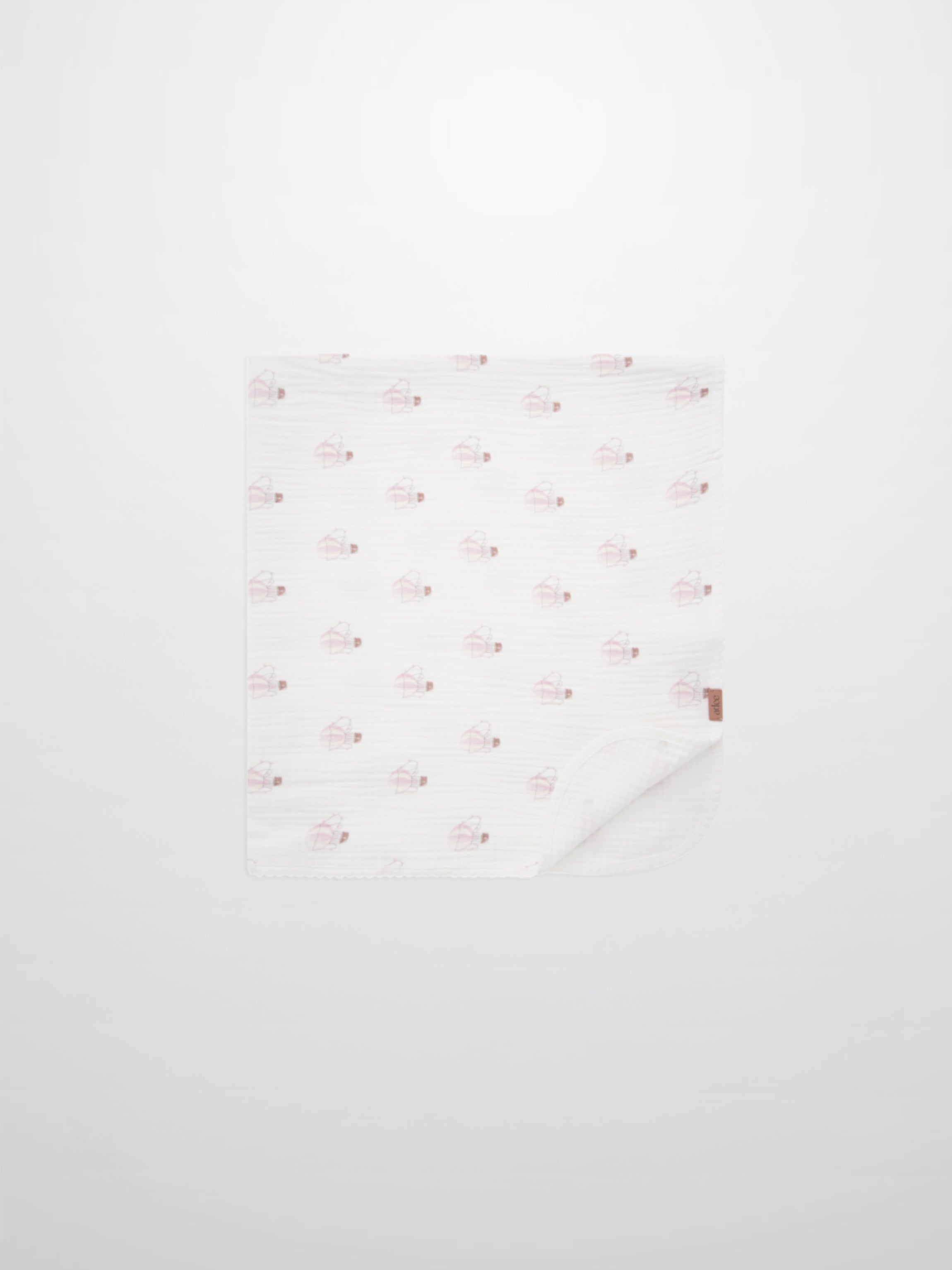Pink balloon-print receiving blanket by Adee with lace trim