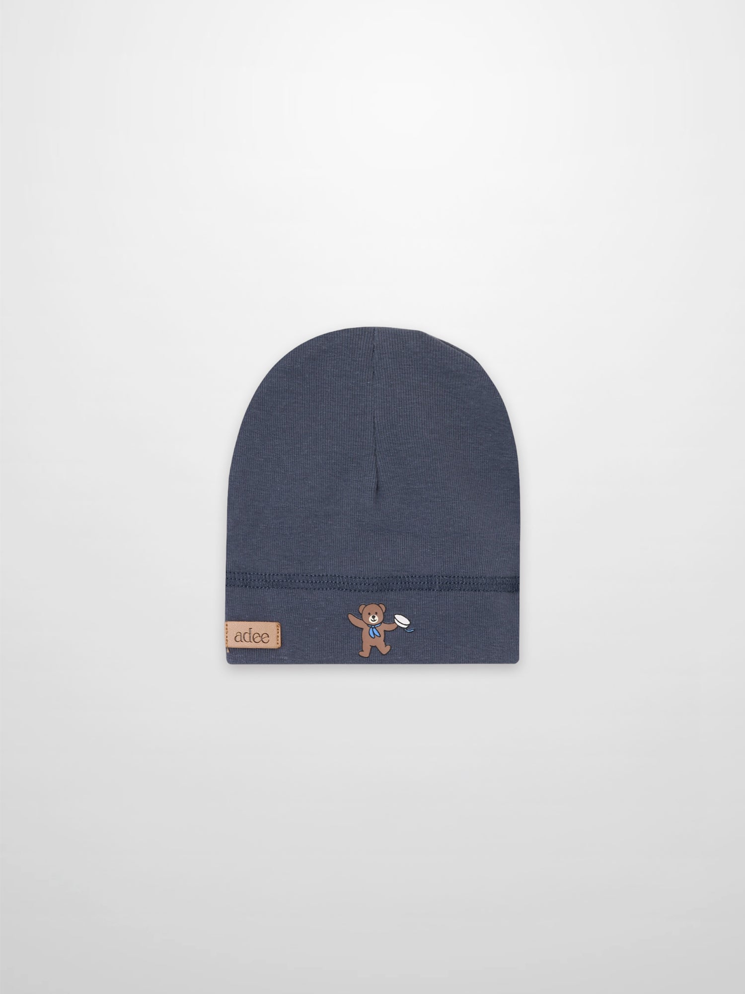 Teddy Frame Hat by Adee; navy blue boys beanie with teddy bear patch on the cuff.