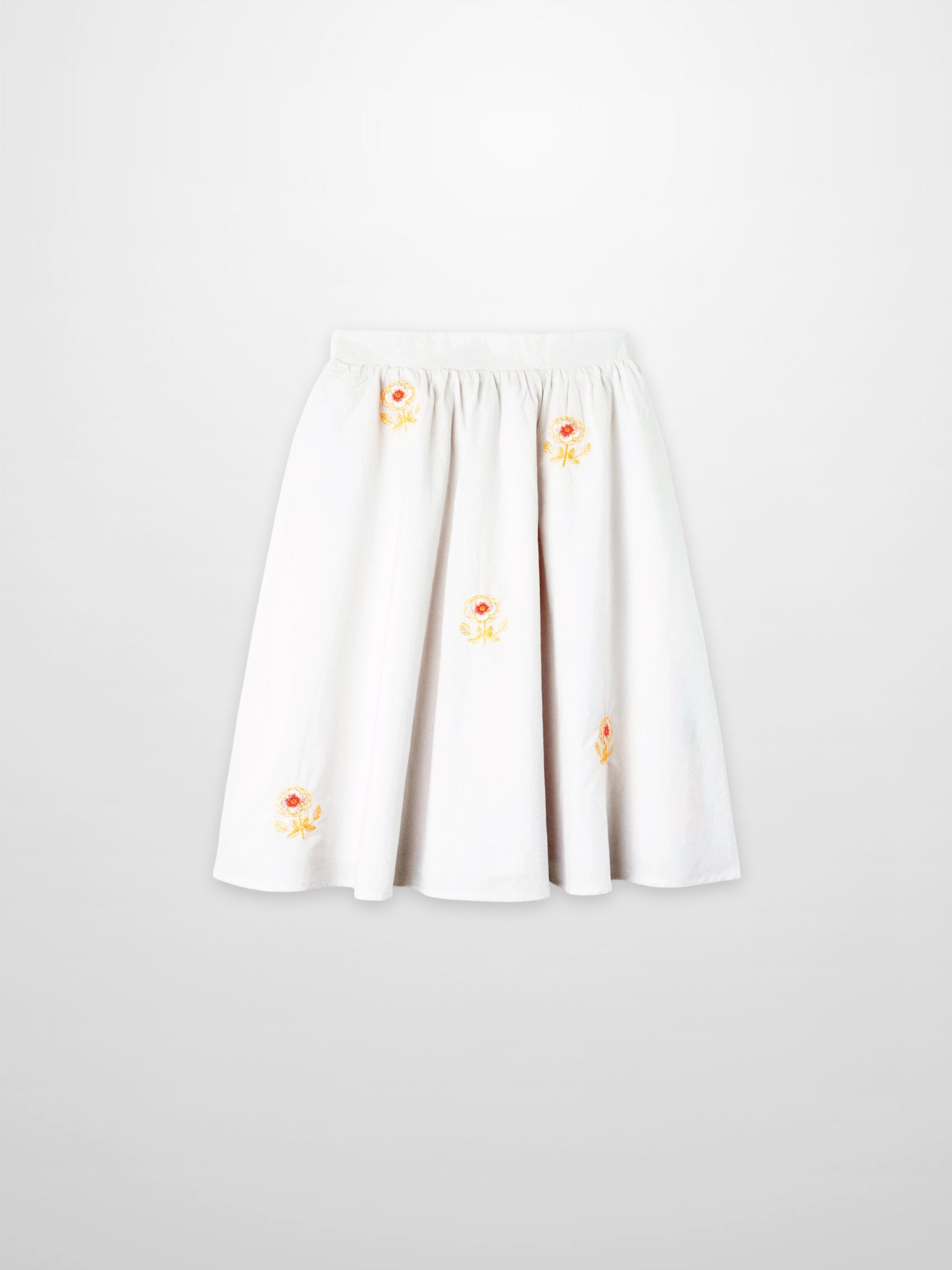 Embroidered Flower Skirt for girls, white dressy skirt with yellow-orange floral embroidery.